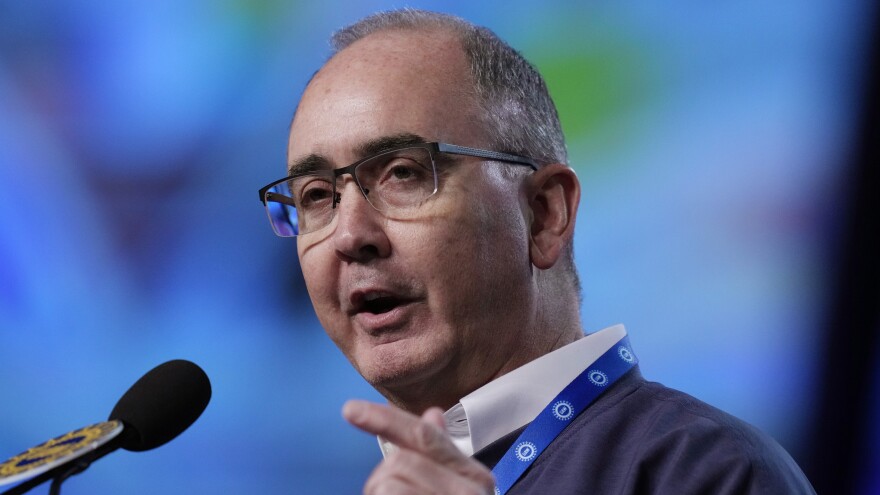 New United Auto Workers President Shawn Fain addresses delegates at the union's 2023 Special Bargaining Convention on March 27 in Detroit.