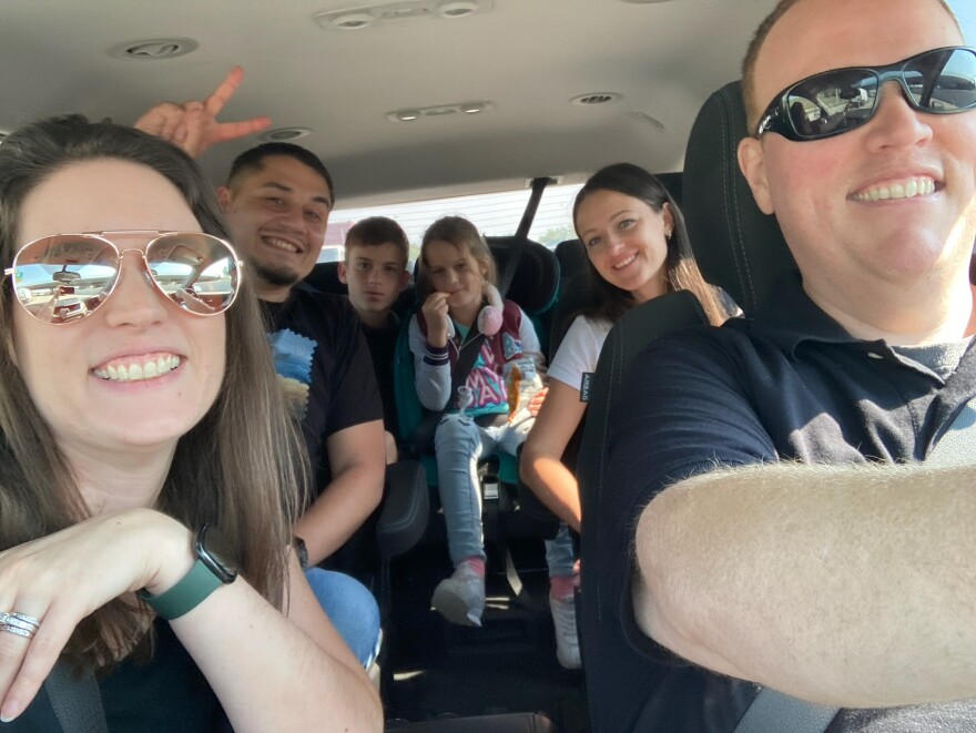 Abby Teigland took this photo with the Yeremenko family, seated in the backseat, after picking them up for the first time from the Kansas City airport.