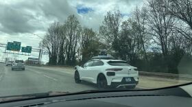 A Waymo car seen driving on 1-85.
