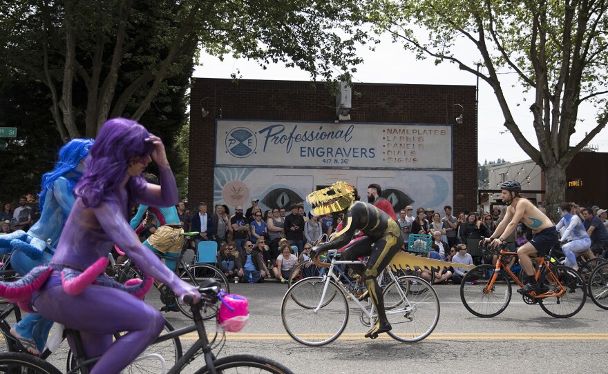 Naked cyclists ride on North 36th Street during the Fremont Solstice Parade and Celebration.