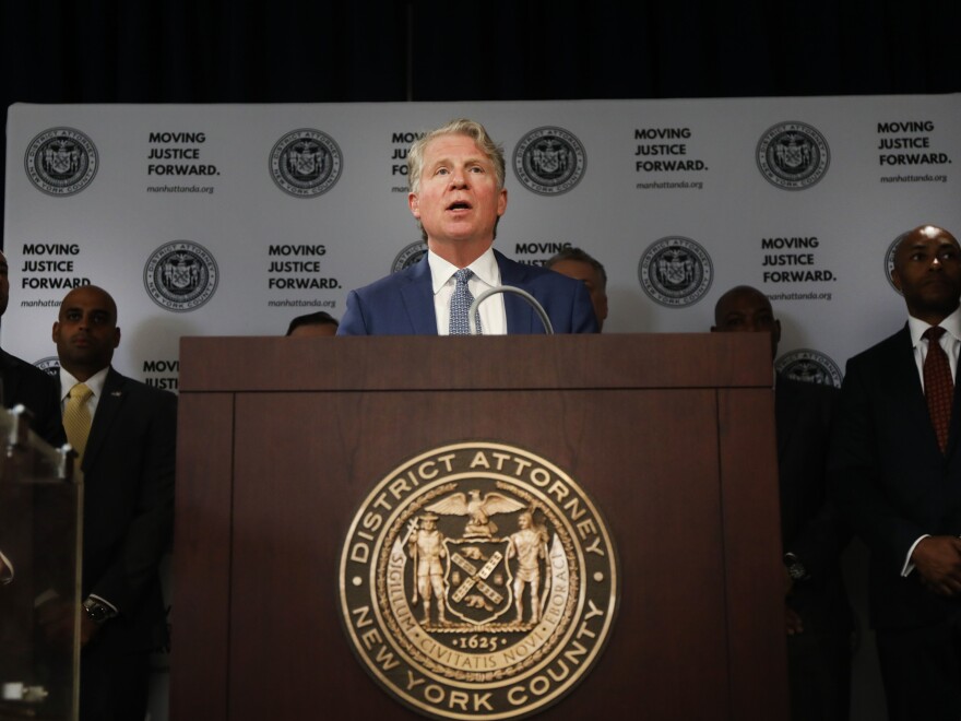 NEW YORK, NEW YORK - APRIL 16: Surrounded by pictures and items seized, Manhattan District Attorney Cyrus Vance Jr. announces the take down of a crime ring run on the dark web on April 16, 2019 in New York City. Following a months-long investigation by the Manhattan District Attorney's Office, three individuals in New Jersey have been arrested in connection to the dark web ring that had about $2.3 million from the sales of counterfeit Xanax, steroids and other drugs prosecutors say. The millions of dollars laundered by the individuals from drug sales was allegedly made with the use of cryptocurrency. (Photo by Spencer Platt/Getty Images)