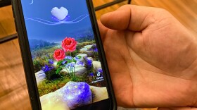S is able to stay in touch with his family still in Afghanistan through the phone, sending one another videos to them how much they are missed.