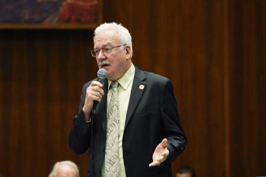 In this Thursday, June 24, 2021, file photo, Rep. John Kavanagh, R-Fountain Hills, speaks during a vote on the Arizona budget at the Capitol, in Phoenix. He's the sponsor of a bill to make it illegal to take photos or video of police officers in some circumstances.