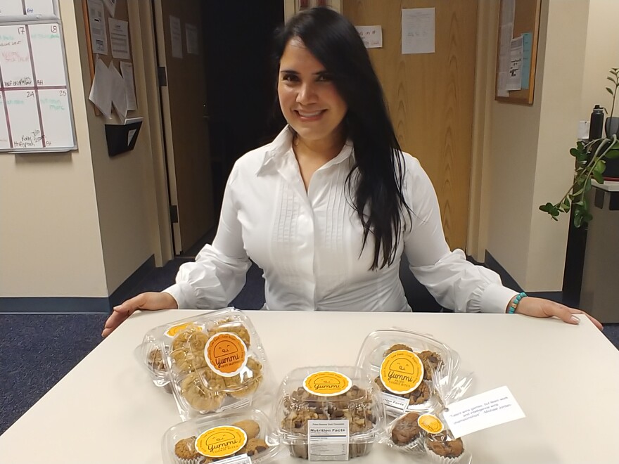 USF graduate degree recipient Adriana Florez is the creator of Yummi Foods, which makes healthy cookies, muffins and empanadas.