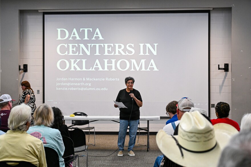 Honor the Earth Volunteer Coordinator Patricia Kaseca stands at the front of the room to introduce herself to her Muskogee neighbors. She helped organize Muskogee's first town hall to inform those in her town about the data centers in Oklahoma.
