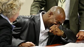 Edwin Chandler reacts to exoneration ruling.