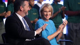 Education Secretary Betsy DeVos and Sen. Ted Cruz announced their proposal for Education Freedom Scholarships on Thursday. The scholarships would allow students to attend private schools or take part in apprenticeships, among other things. CREDIT: Chip Somodevilla/Getty Images