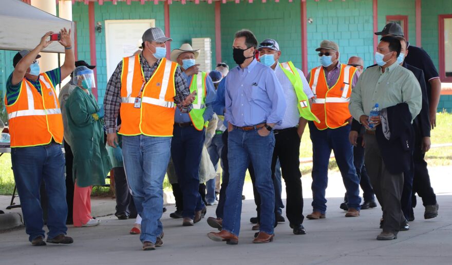 Gov. Steve Bullock (center) with Crow Nation Chairman AJ Not Afraid (R) and officials from the Indian Health Services at a community testing event in Crow Agency May 27, 2020.