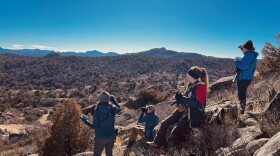 A team of researchers, including two scientists from South Dakota State University, search for pinyon jay colonies in Colorado.