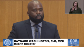 Mecklenburg County Health Director Dr. Raynard Washington gives an update to county commissioners Tuesday evening.