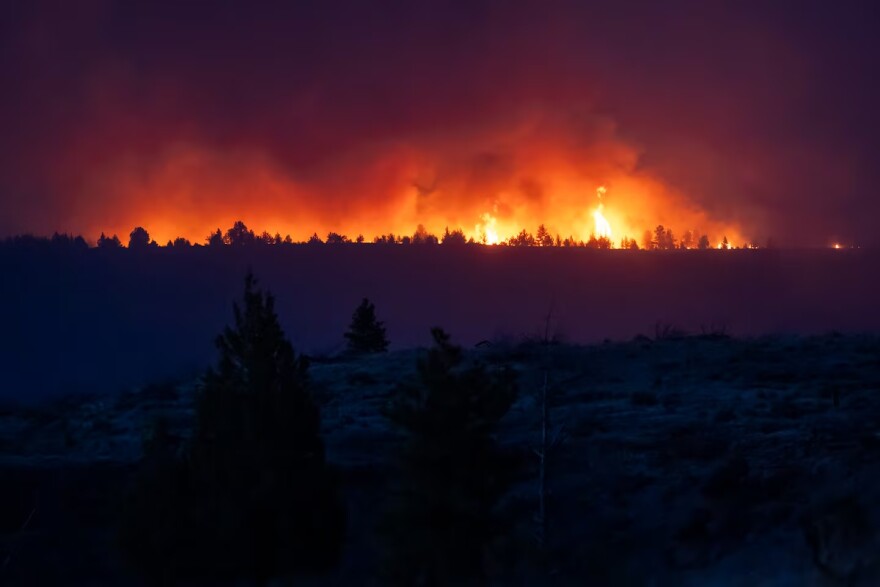 The Bench Fire burns on the Warm Springs Reservation, seen from Culver, Ore., on July 27, 2026.