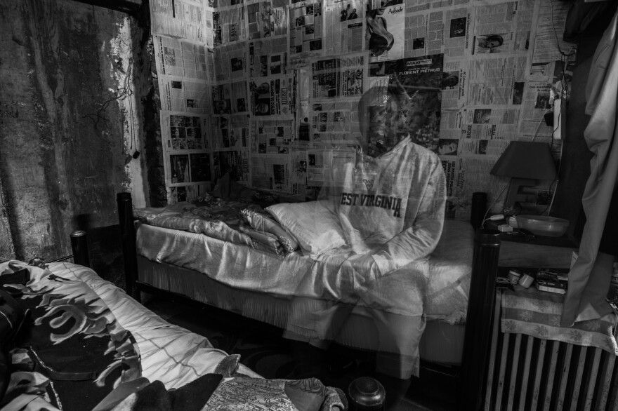 An illegal immigrant from sub-Saharan Africa, living in Algeria in the sub-basement of a 21-story building. The photographer calls his series of immigrant photos "Ca va waka" — a blend of French and English that means "It's going to be okay."