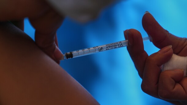 A health worker administers a dose of the measles vaccine in Chapultepec Park in Mexico City, Sunday, Feb. 8, 2026.