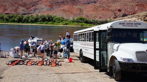 An Arizona Raft Adventures shuttle bus at Lees Ferry in May 2026.