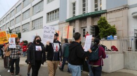 Teacher practice picket outside Washington High on November 12, 2025.