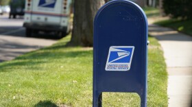 A United States Postal Service mailbox stands along Bonnie Brae Boulevard Monday, Aug. 17, 2020, in southeast Denver.
