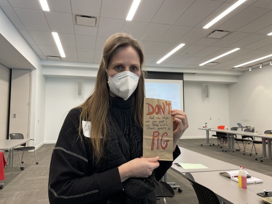 Sarah Kipp's lunch bag says "Don't let the boys see you eat, or they will think you're a pig."