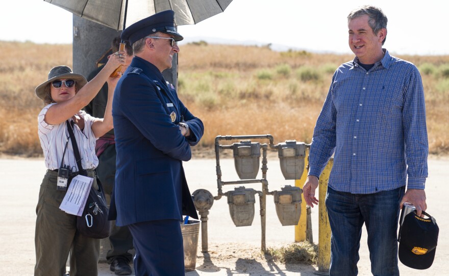 Steve Carell, left, speaks with Greg Daniels on the set of Space Force. The two also worked together on The Office.
