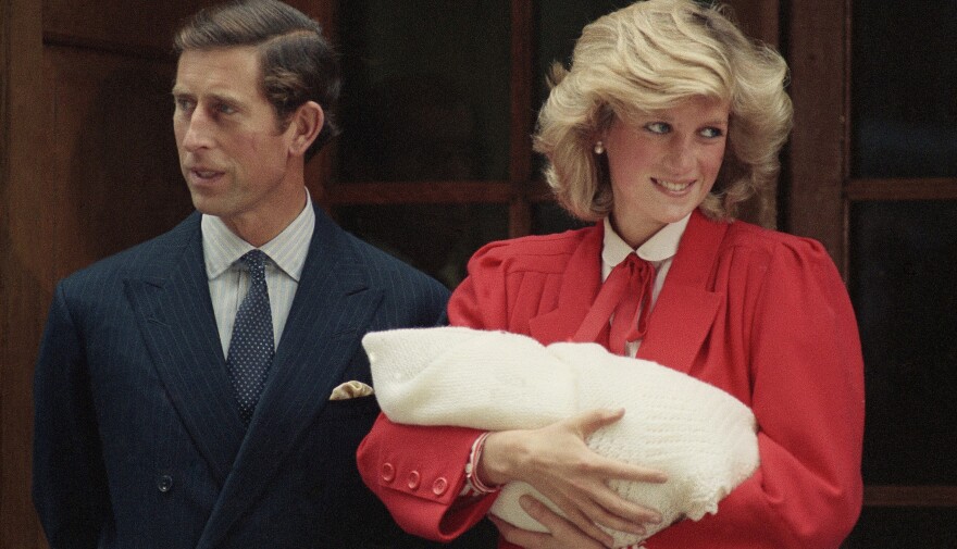 Britain's Prince Charles and Princess Diana leave St. Mary's Hospital in Paddington, London, with their new baby son, Harry, on Sept. 16, 1984.