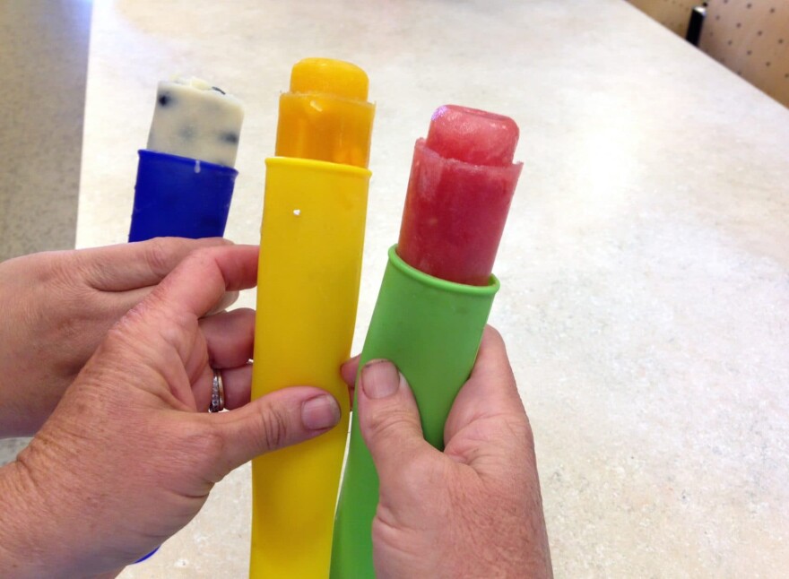 Kathy's maple yogurt-blueberry (left), mango (middle) and watermelon-lime (right) popsicles. (Jackson Mitchell/Here & Now)