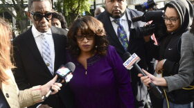 Former congresswoman Corrine Brown walks into Federal Court accompanied by pastor Rudolph McKissick, Sr. Brown appeared in Federal Court to be sentenced on fraud charges. Her former chief of staff, Ronnie Simmons and One Door for Education President Carla Wiley will also be sentenced. (Bob Mack/The Florida Times-Union via AP)