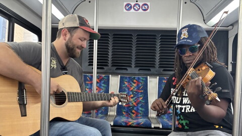 Musicians Nick Rose and Preston Charles the Third entertained commuters on TANK buses for a day.