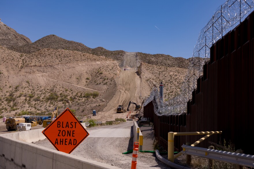 Contractors are using explosives to carve out the side of the landmark Cristo Rey mountain that oversees two countries and three states.