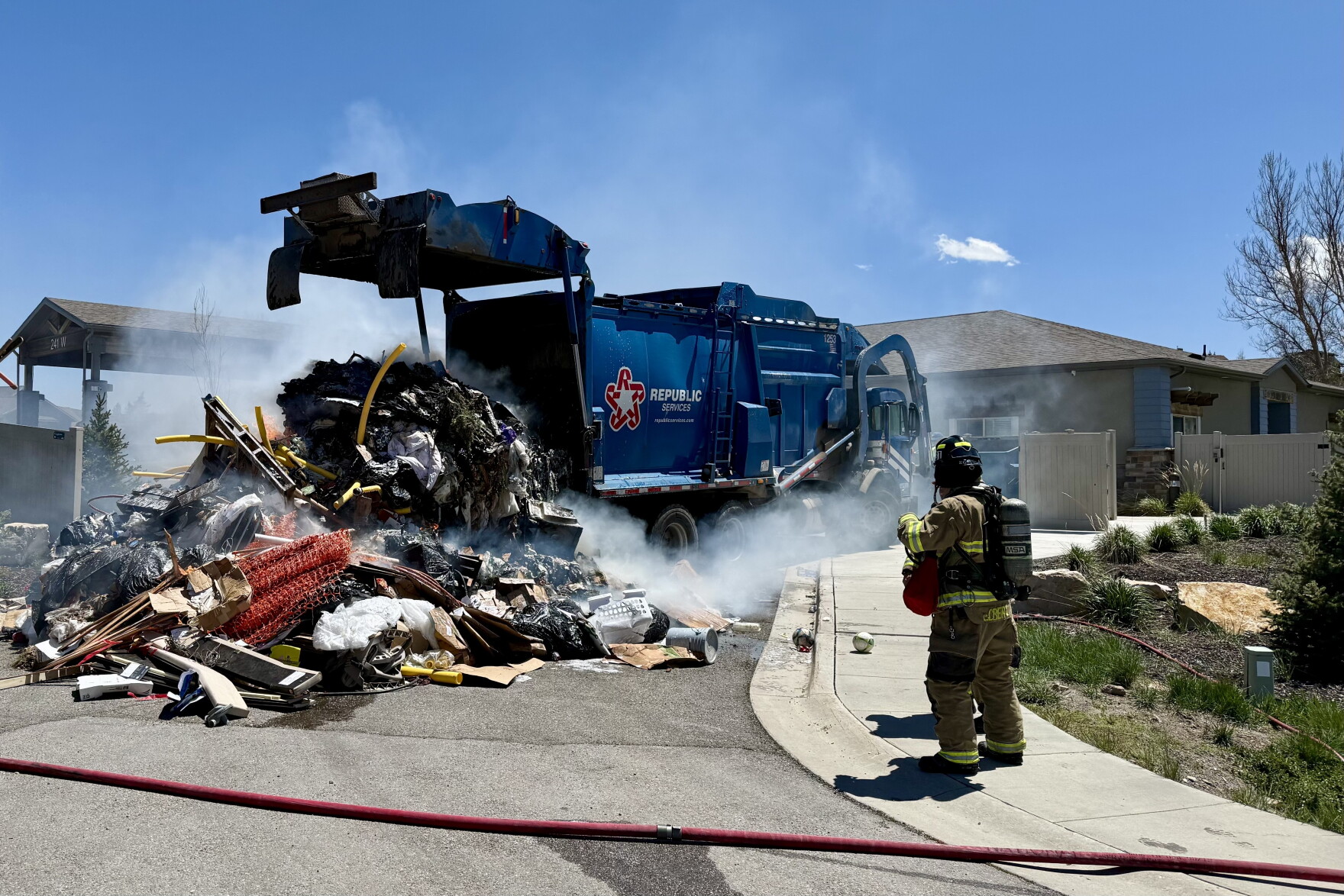 Garabe Fire Trash truck load catches fire in Highland Estates