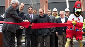 Cardinals team president Bill DeWitt III and other Ballpark Village representatives officially open PwC Pennant Building in downtown St. Louis. 11/06/19