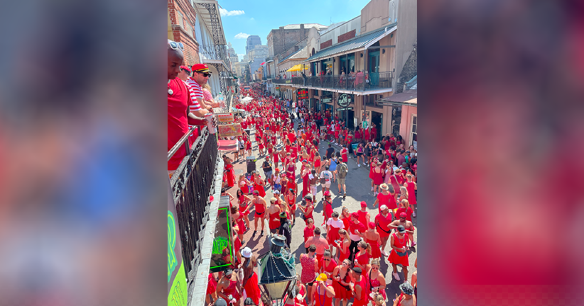 Photos: Thousands paint the Quarter red at annual Red Dress Run | WWNO