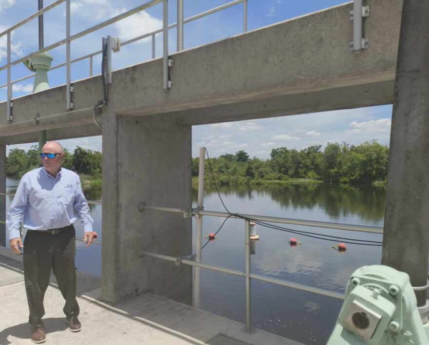 Richard Anderson, the Executive Director of the Peace River Manasota Regional Water Supply Authority stands at the authority’s water pump site along the Peace River during a tour of the water facility on May 6.