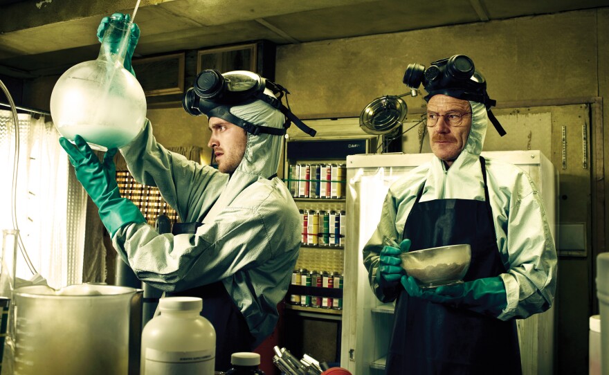 Jesse Pinkman (Aaron Paul) and Walter White (Bryan Cranston) form an unlikely partnership in <em>Breaking Bad</em>.