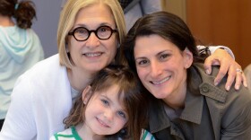 Suzi Brant with daughter Vallie Freeman and granddaughter Harper, representing three generations of Jewish women in Cincinnati.