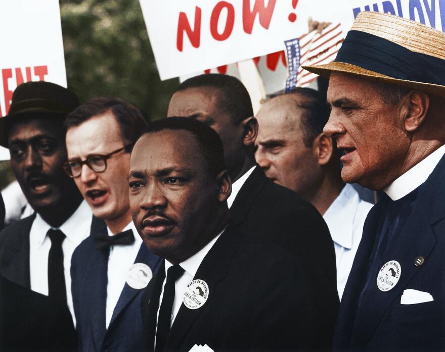 Dr. Martin Luther King, Jr. and Mathew Ahmann in a crowd.