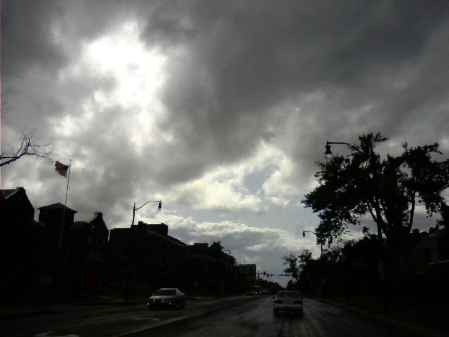 Clouds darken along Main Street just before thunderstorm in Buffalo Monday afternoon