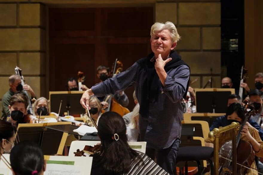 RPO Music Director Andreas Delfs conducts the orchestra during a rehearsal for "Hansel and Gretel."