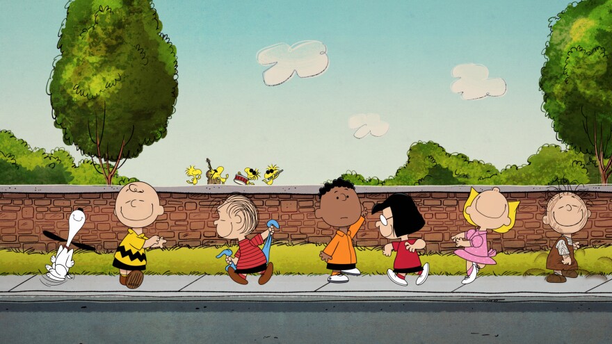 Snoopy, Charlie Brown, Linus and the rest of the 'Peanuts' gang dance to the accompaniment of a band of birds.