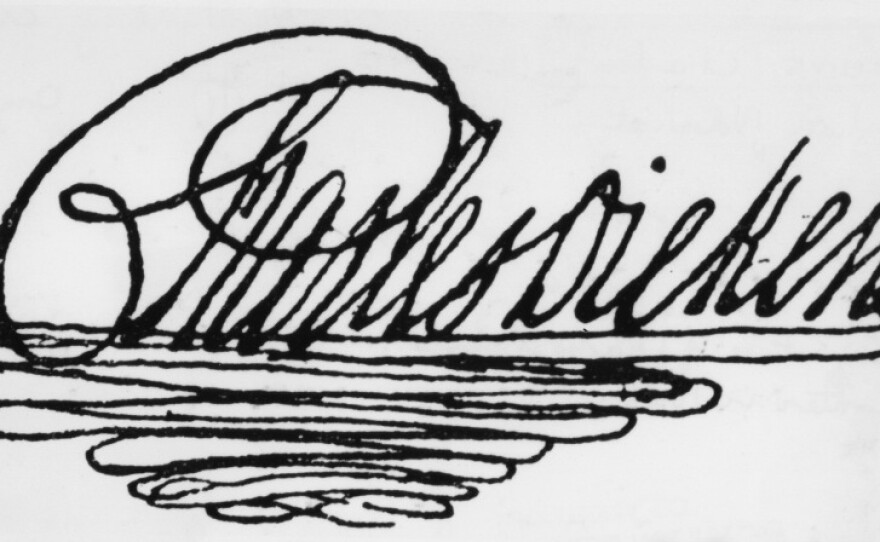 Dickens had an elaborate signature — his name set atop a triangle of flourishes.