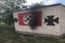 Gov. Eric Holcomb called on lawmakers to pass hate crimes legislation following vandalism at Congregation Shaarey Tefilla in Carmel this summer. (Photo courtesy: Indianapolis JCRC)