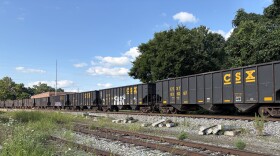 A train of CSX coal hoppers rumbles through Richmond, Kentucky, on the way to Corbin, Kentucky.