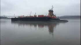 A barge run aground in the Hudson River in Catskill Tuesday.