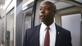 FILE - In this May 27, 2021, file photo Sen. Tim Scott, R-S.C., arrives as senators go to the chamber for votes ahead of the approaching Memorial Day recess, at the Capitol in Washington. Congressional bargainers are likely to blow past their latest deadline without completing a bipartisan deal for overhauling police practices, three people familiar with the talks said Thursday, June 24, 13 months after George Floyd’s killing and with the shadow of next year’s elections lengthening over Congress’ work. Despite a “June or bust” goal set by chief GOP negotiator Scott, the Senate was expected to leave town for a two-week recess after Thursday’s session without a final compromise, according to two Democratic aides who described the status of talks on condition of anonymity. (AP Photo/J. Scott Applewhite, File)