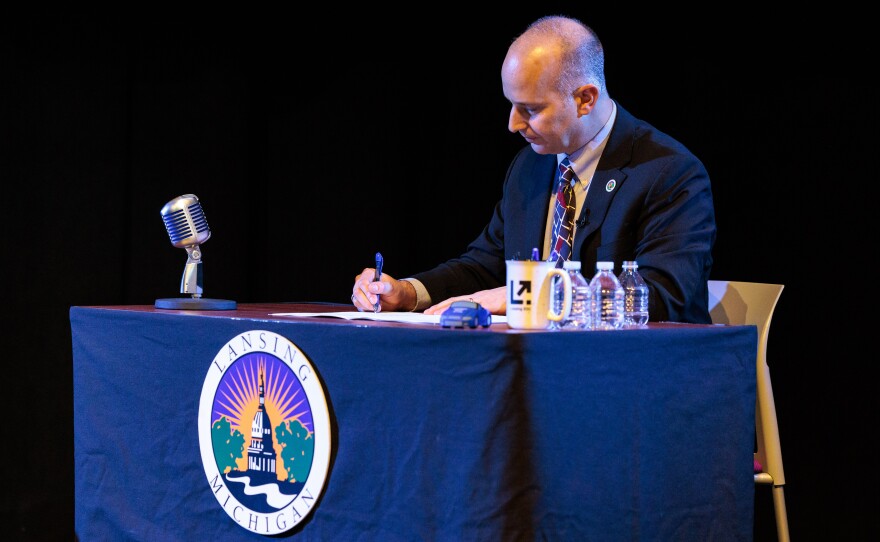 Lansing Mayor Andy Schor delivers his State of the City Address at Dart Auditorium in Lansing, Mich., on March 18, 2026. Rather than giving a traditional speech, Schor sat behind a talk show style desk and invited city staff to provide updates on their departments' achievements from the past year.