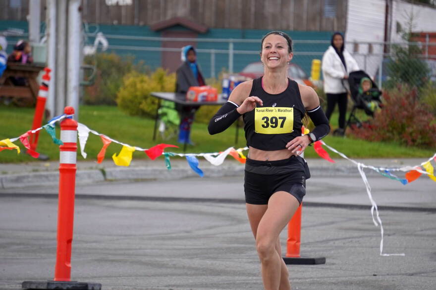 Amanda Cherok races into the finish chute of the Kenai River Marathon on Sunday, Sept. 27, 2026, at the Kenai Chamber of Commerce and Visitor Center in Kenai, Alaska.