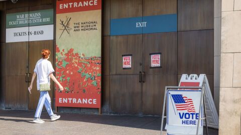 A voter enters a polling location at the National World War I Museum to submit a ballot for the August 2022 primary election.