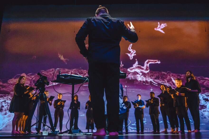 Verdigris Ensemble artistic director Sam Brukhman conducting "Shams," an audiovisual production set to the music of 13th century poet Rumi.