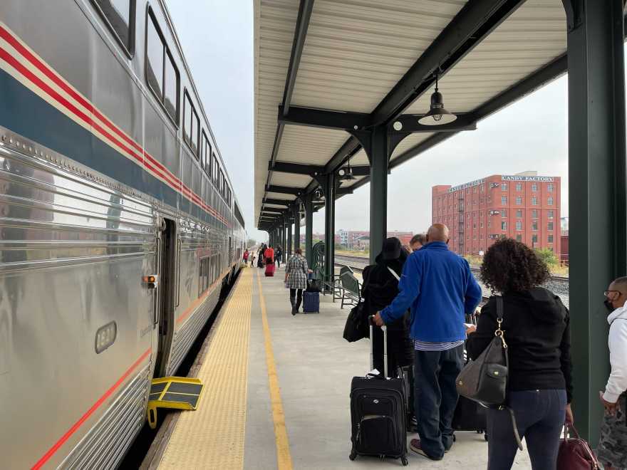 Passengers line up to board the Heartland Flyer at Oklahoma City's Santa Fe Depot. The passenger train is a once-daily round trip line from OKC to Fort Worth, Texas.