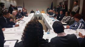 Gov. Eric Holcomb listens to residents and community leaders address some of their concerns with the lead contamination in East Chicago, Indiana. (Lauren Chapman/IPB News)