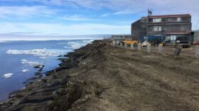 A piece of the Utqiaġvik coastline in a residential area near downtown. Some of this bluff was eroded away during the September 2017 storm. Visible to the left are “supersacks,” part of the North Slope Borough’s current strategy for combating erosion. July 16th, 2018. (Photo by Ravenna Koenig/ Alaska’s Energy Desk)