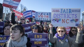 Protesters against gerrymandering at a March 2019 rally coinciding with Supreme Court hearings on major redistricting cases. After the court said the federal judiciary has no role in partisan redistricting cases, legal action is focused on state courts.